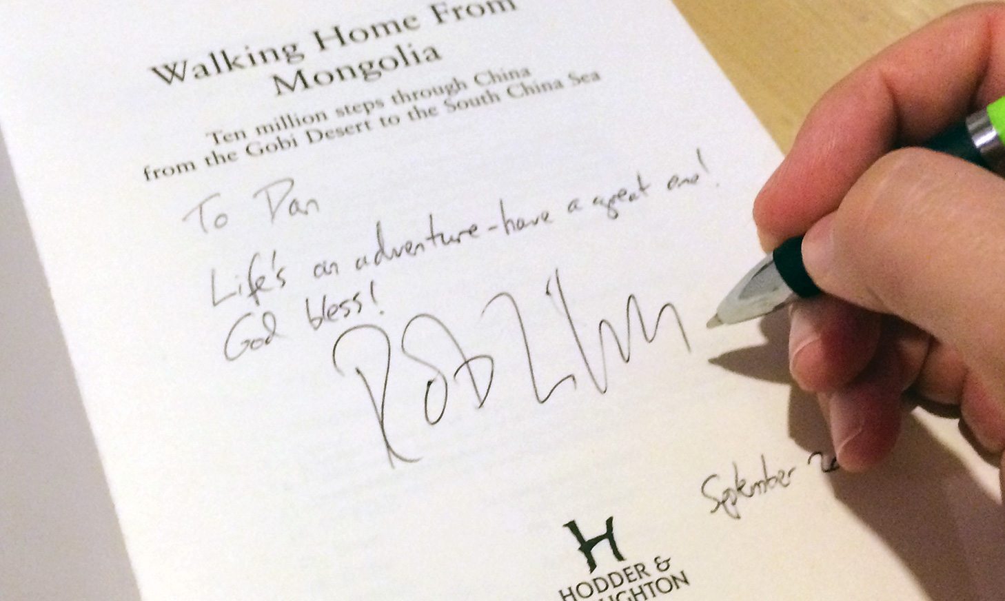 Signing a book