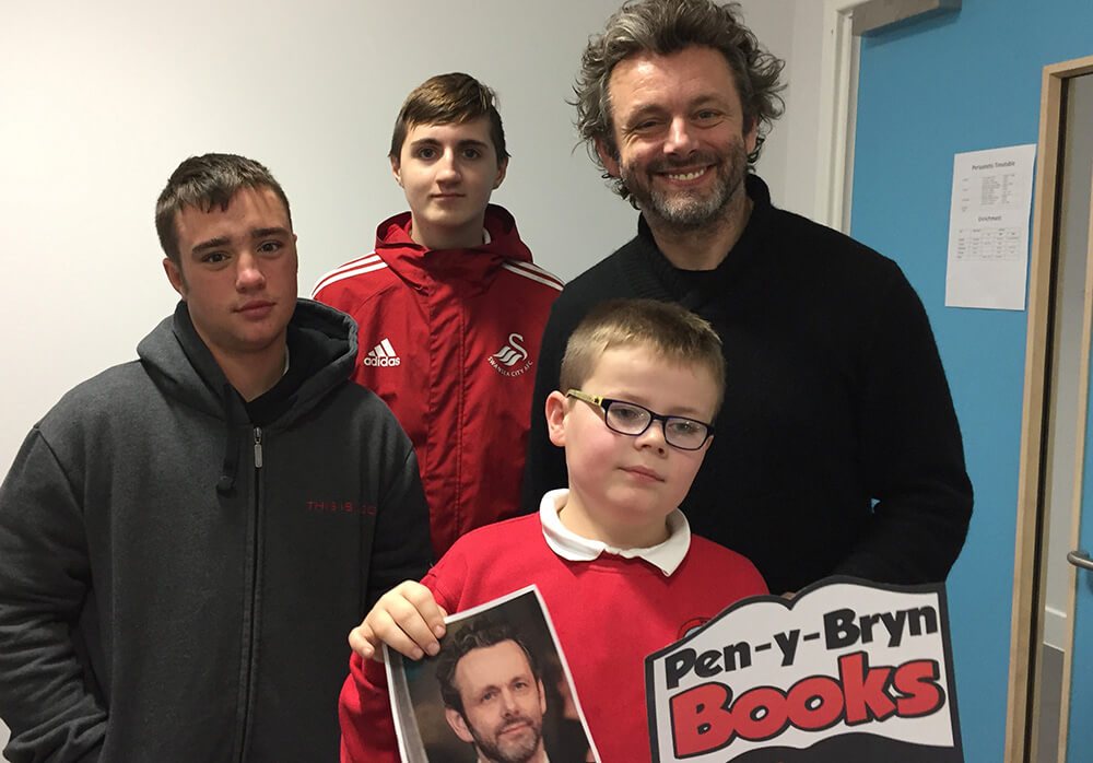 Michael Sheen with pupils at Ysgol Pen-y-Bryn