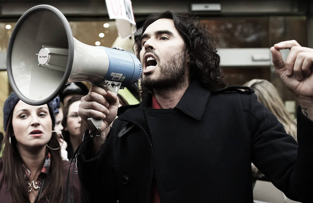 Russell Brand with a megaphone