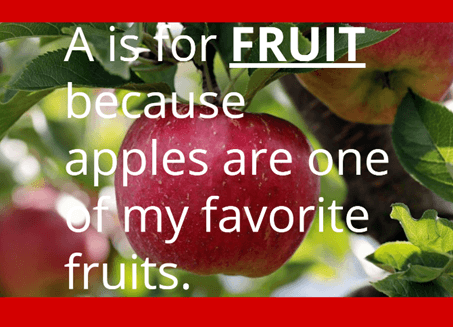 A ripe red apple hanging from a tree branch, with the text: 'A is for FRUIT because apples are one of my favorite fruits.'