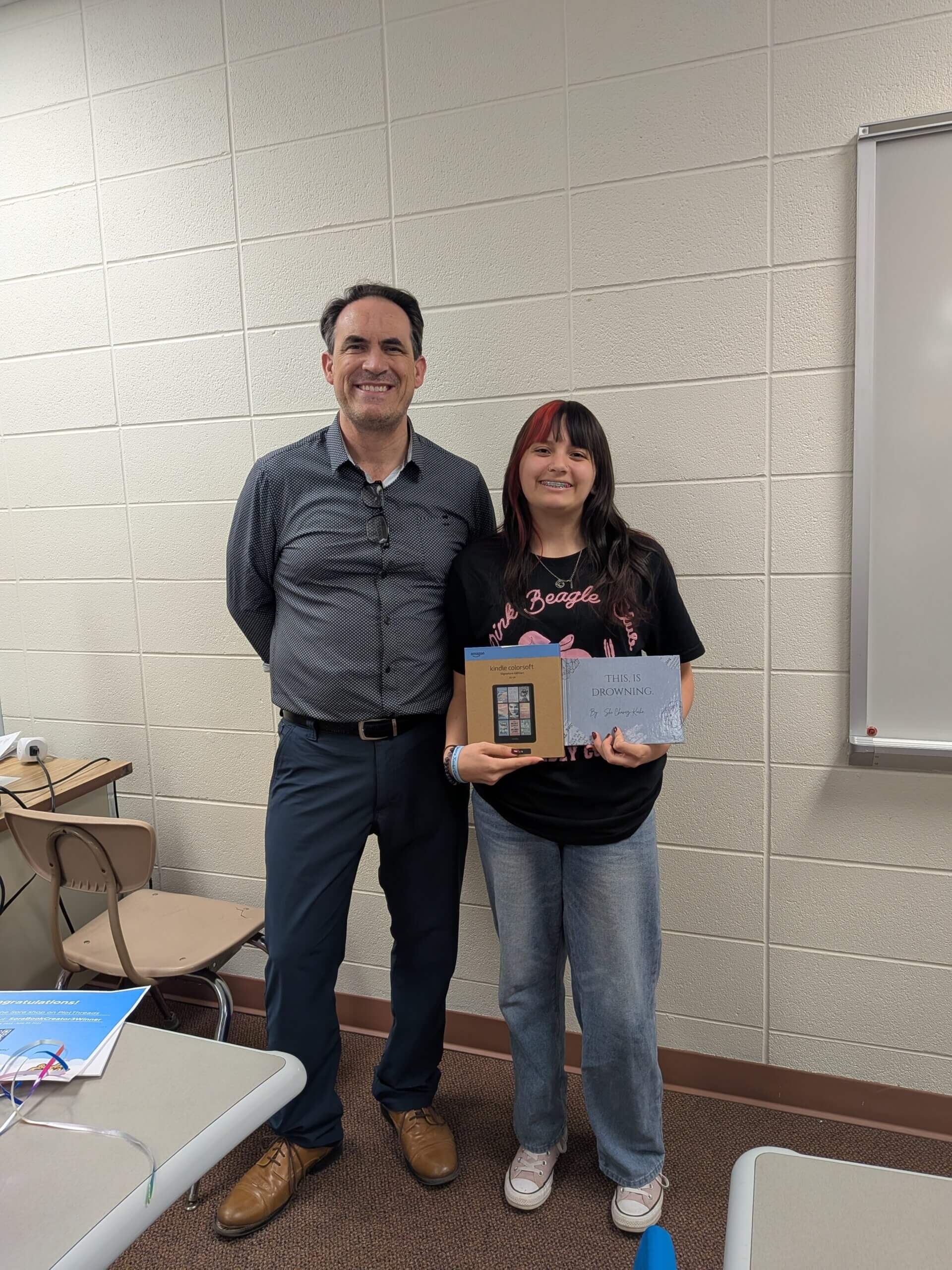 Shi is pictured with her teacher Barton